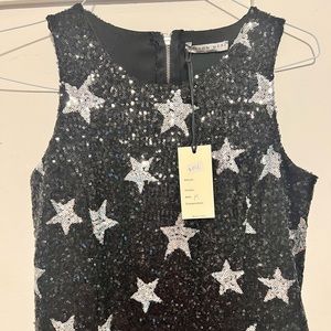 Star jumper by Madison Mere from Italy.